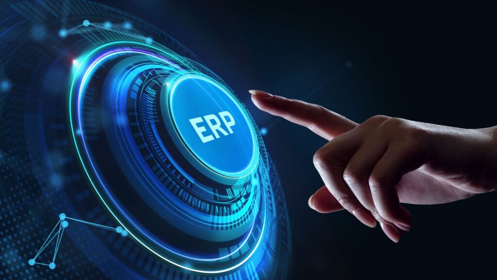 Hand reaching toward a glowing digital ERP button on a futuristic interface, symbolizing enterprise resource planning and technology-driven business transformation.