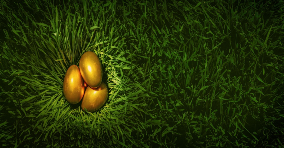 Golden eggs on green grass - Food and Beverage ERP