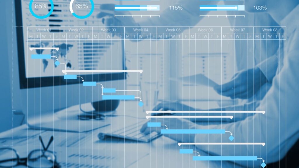 Project management scheduling concept with Gantt chart planning with tasks and milestones to monitor progress and deliverables with manager team in background working on computer in office