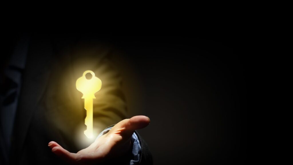 A glowing key in a hand