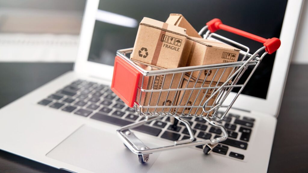 e-commerce, shopping trolley with paper boxes