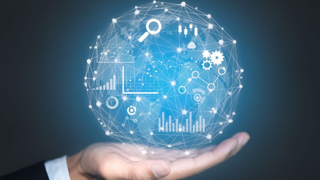 Overcoming Data Migration Challenges: Turning Obstacles into Opportunities 3 Hand holding a digital globe with data charts, analytics icons, and network connections, symbolizing overcoming Data Migration Challenges through business intelligence and analytics.
