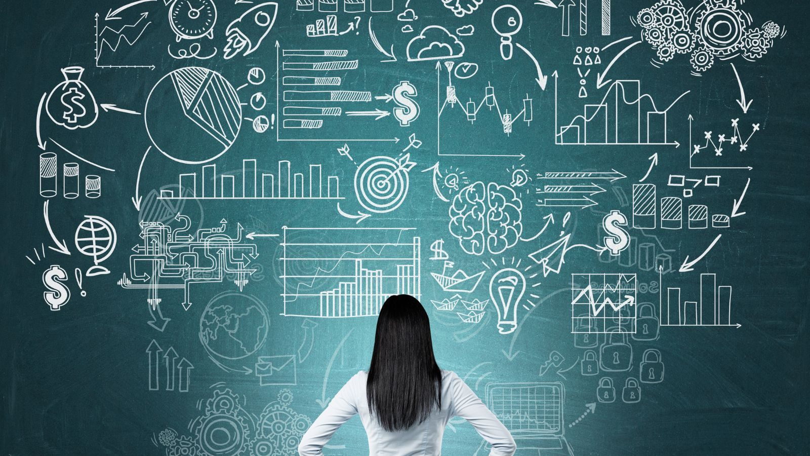 Business professional facing a chalkboard filled with charts, graphs, automation icons, and data workflows, representing AI-driven business analytics, ERP strategy planning, and decision intelligence in Microsoft Dynamics 365 during a Business Central Copilot implementation.